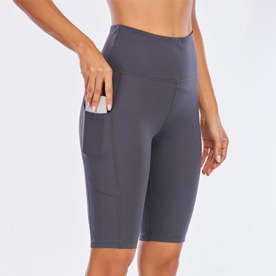 China 2022 Breathable New Gray Sport Quick Dry Fitness Shorts Solid Color Peach Butt High Rebound Yoga Mid Waist Shorts for sale