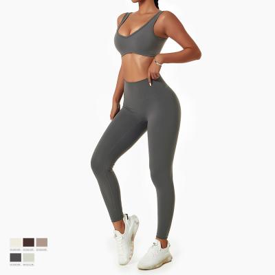 China Breathable Workout Gear For Women 2 Piece High Waist Seamless Leggings With Sports Bra Yoga Set for sale