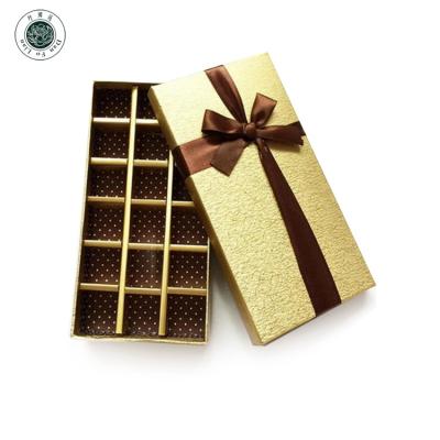 China Handmade Lid And Bottom 2 Piece Boutique Gift Box For Candy Chocolate Gift Packaging Gold Box With Ribbon for sale