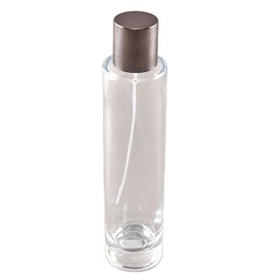 China New Fashion Cosmetic Perfume 100ml Empty Clear Essential Oil Glass Bottle For Silver Brown Cap for sale