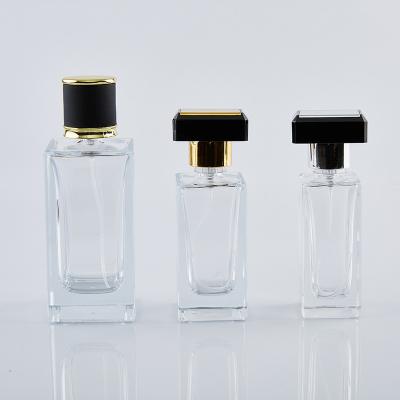 China Cosmetic Custom Square Shape 35ml 50ml 100ml Empty Clear Glass Perfume Bottle With Perfume Cap for sale