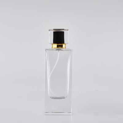 China Lurury high quality rectangular empaty perfume glass bottle 100ml with black cap with spray atomizer for sale