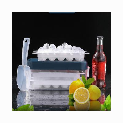 China Neben Refrigerator Freezer Plastic Box Double Layer Silicone Round Ball Reusable Stored Ice Cube Trays with Bin and Lid for sale