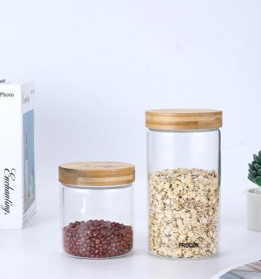 China WITH LID 24oz Clear Glass Jar Wholesale High Borosilicate Glass Storage Bottled Jar With Lid Wooden Vintage Large Glass Storage Jars for sale