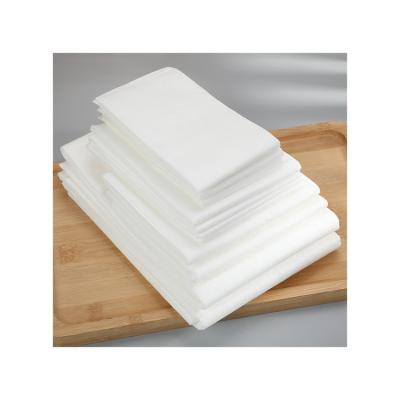 China Spa Disposable Facial Massage Nonwoven Fabric Paper Towel Wood Pulp Hot Hard Absorbent Disposable Towels Nek014 for sale