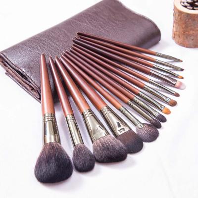 China Angular Blush Red Professional Wood Paint Handle Makeup Brush With Goat Hair for sale