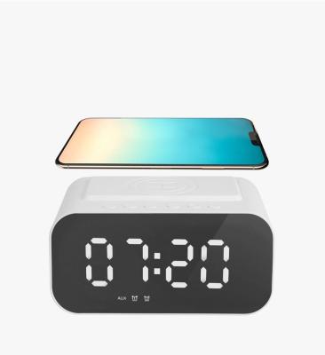 China Wireless charger for new mobile phone wireless charging speaker optimized alarm clock radio 10W blue tooth speaker factory supply for sale