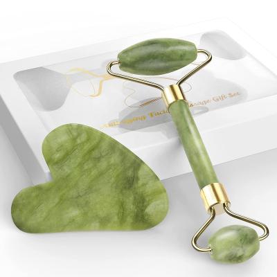 China 2021 hot sale 100% face face massager Xiuyan green jade reducer original roller barbed roller in raw Xiuyan jade gua sha stone for sale