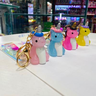 China Promotion Gift Wholesale Promotion Gift Low Price Irregular Light Unicorn Cute Plastic Keychains for sale