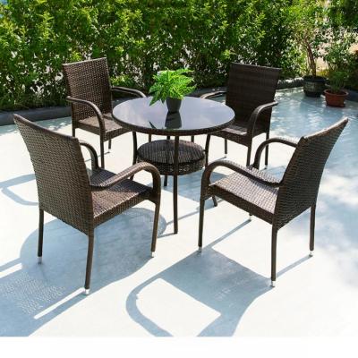 China Modern Outdoor Rattan Dining Table And Chairs Set With Woven Rope Chairs Size 50*55*89cm for sale