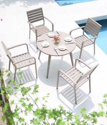 China Outdoor Patio Dining Table With Stackable Chairs For Terrace for sale