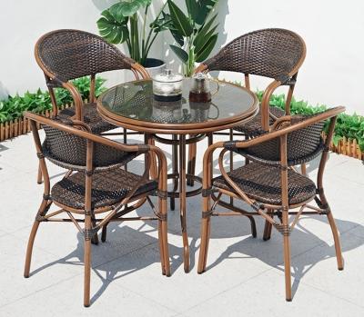 China Glass Top PE Rattan Garden Dining Table And Chairs 5pcs Sets for sale