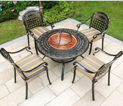 China Courtyard Cast Aluminum Patio Barbecues Table And Chairs Sets for sale