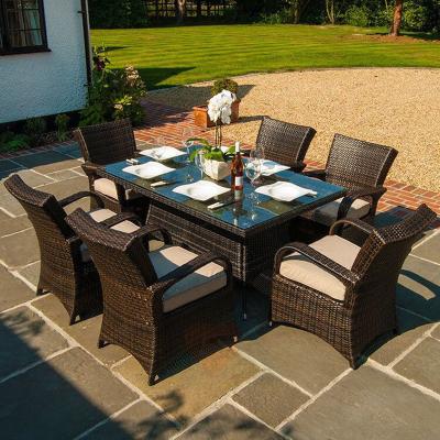 China Minimalist New Nordic Courtyard Handmade PE Rattan Table and Chairs Sets for sale