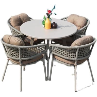 China Modern simplicity five pieces of outdoor rope-woven furniture sell well in living room, outdoor luxury rope dining chairs for sale