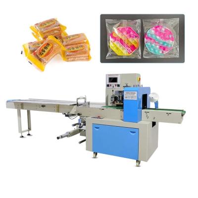 China Good Quality Food Chop Sticks Roll Down Belt Pillow Packing Flow Wrap Machine Film Coding for sale