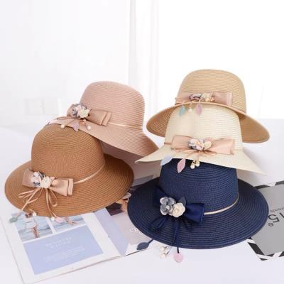 China Ladies Bucket Hat Flower Lace Ribbon Straw Hats Big Brim Beach Foldable Hat for sale