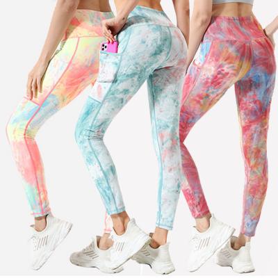 China 2021 Breathable Tie Dye Fitness Waist Breathable Yoga Pants Women High Hip Cuffs With Pocket for sale