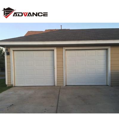 China Embossed pattern white colour woodgrain motive automatic safety pu foam insulated steel sectional overhead garage door for sale