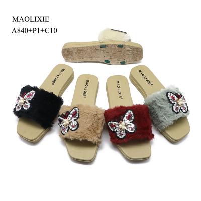 China Anti-slippery Cheap Price Fashion Faux Hairy Indoor Home Fur Slides Slippers Plush Sandals For Women for sale