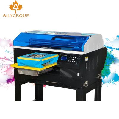 China Garment shops factory dtg printer digital flatbed t-shirt printing machine custom printer for sale