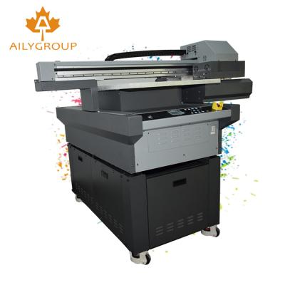 China Garment Shops Digital Flatbed Led Printer 60x90 UV With Rotary for sale