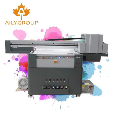 China Hotels Size A4 Size Varnish UV Printer For Any Material To Print for sale