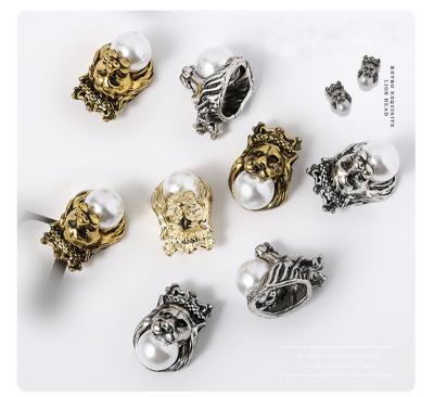 China New Luxur Central Institute of Statistics metal European Lion Head retro punk bead nail accessories and American style Tiger Nail Paste Decoration for sale