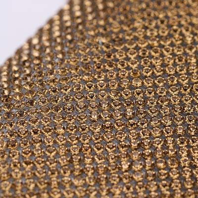 China Flatback A.C.A. Grade SS6.5 Glass Rhinestone Net Mesh 2mm Crystal Hot Fix Rhinestone Sheet for sale