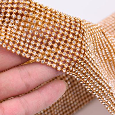 China Woven Metallic Accessories Crystal Fabric Rhinestone Sheet Plain Weave Heat Transfer Metal Fabric Sequin Fabric for sale