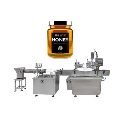 China Automatic Beverage Honey Packing Machine 250ml Glass Jar Filling Capping Machine For Honey for sale