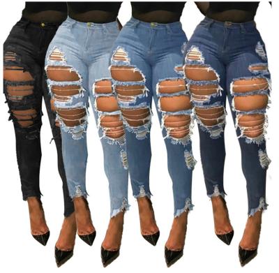 China Clothing factory wholesale QUICK DRY women's jeans damaged high waist tight super skinny ripped women's denim stretch pants for sale