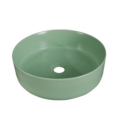 China Easy Clean Artistic Countertop Vessel Sink Green Color Round Ceramic Bathroom Basin for sale