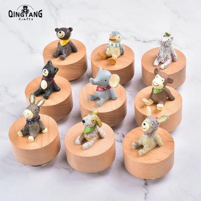 China Beech Wood For Christmas Wooden Home Decoration Wooden Music Box Rotating Animal Music Box for sale