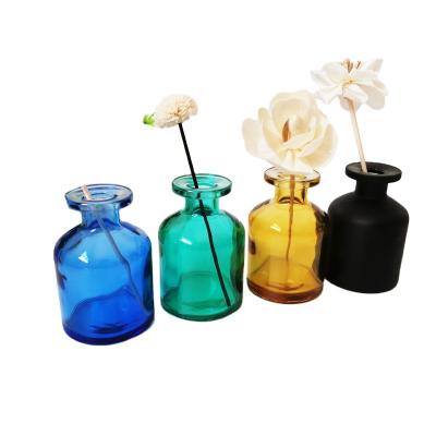 China 50ml Aromatherapy Fireproof Creative Glass Bottle Diffuser Clear Colored Glass Bottle Customized by Europe 100ml 150ml 200ml for sale