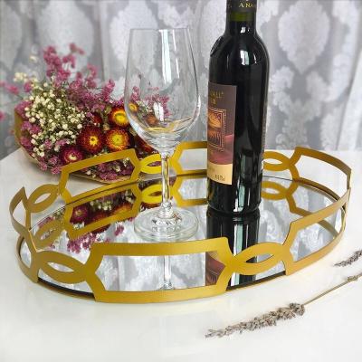 China Sustainable Luxury Golden Multifunctional Cake Home Hotel Tray Mirror Iron Storage Cosmetic Tray for sale