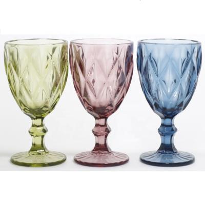 China Retro Viable Diamond Shaped Embossed Tall Glass Serpentine Cups 300ml Wine Glass Champagne Cocktail Glass for sale