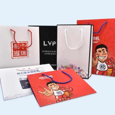 China Handmade Full Color Printing Artpaper Shopping Bag Packaging Recycled Paper Carrier Bag for sale