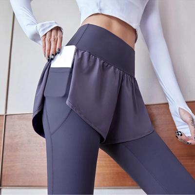 China QUICK DRY Women's Yoga Pants Two Pieces Elastic Top Seamless Gaiters For Running Fitness Exercise Tights Gaiters for sale