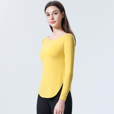 China Loose Tops Solid Color Yoga Blouses Tops Yoga Clothes Ladies Simple And Slim All-match Long Sleeve Breathable Cotton T-shirt Yoga Tops for sale