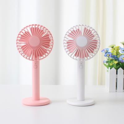 China Logo Designs Italy Rechargeable Plastic Mini Round Small Hand Kids Hand Cute Fan for sale