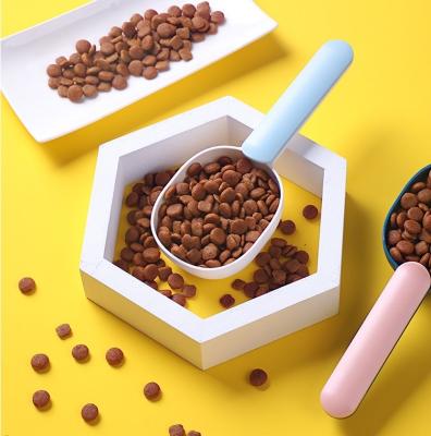 China New Automatic Pet Food Scoop Clip Plastic Pet Food Measuring Scoop for sale