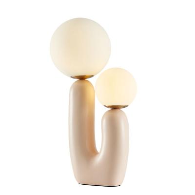 China Modern Nordic Creative Pink Art Creative Art Bedroom Living Room Study Lamp Table Glass Ball Decorative Lamps for sale