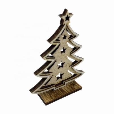 China Hollowed-out Wooden Handmade Shaped Material Christmas Tree Decorations for sale