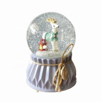 China Gift Handmade Resin Cute Deerlet Music Box Glass Snow Globe for sale