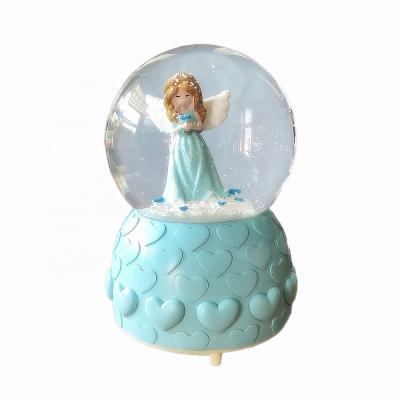 China Gift Custom Design Souvenirs Angel Snow Ball Music Box Crystal for sale