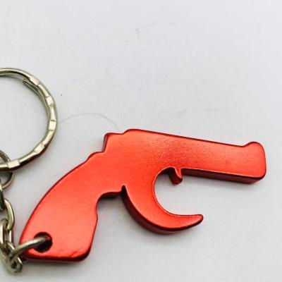 China China custom made metal gun shape key chain bottle opener for beer bottle for sale