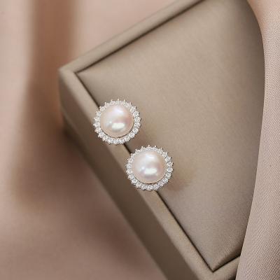 China Other Fashion Classic Sunflower Natural Freshwater Steamed Bread Pearl Earrings Women's S925 Sterling Silver Micro Inlaid Crystal Ear for sale