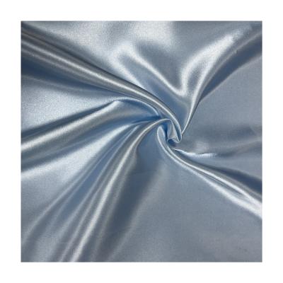 China Durable Shiny Spot Goods 50*75 Silk Satin Fashion Dress Pajamas Clothes Lining Fabric Satin for sale