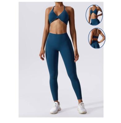 China Soft Sexy Hot Breathable Gym Fitness Compression Running Cross Back Workout Twist Yoga Sports Bra For Women Girls for sale